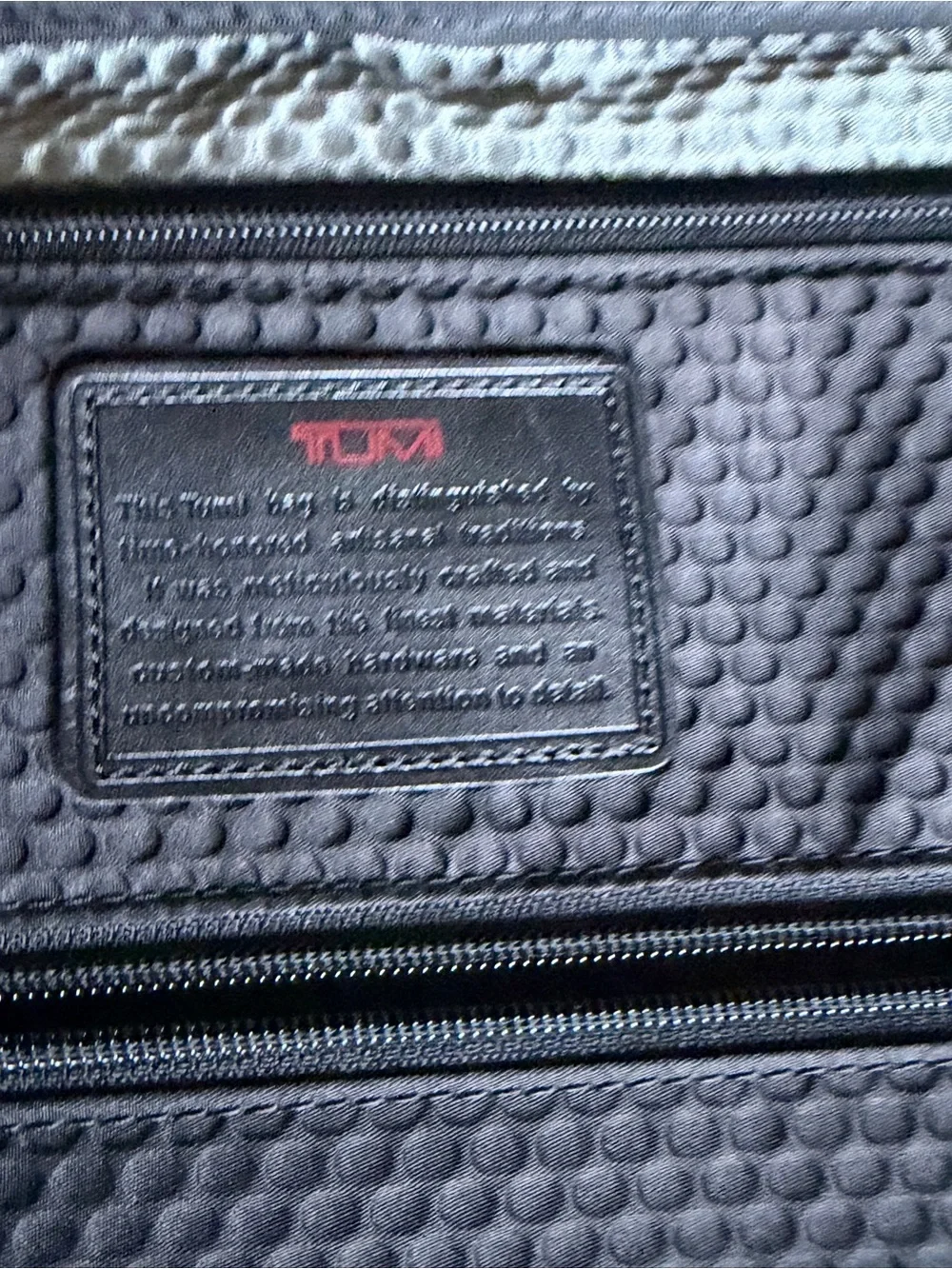 Tumi Black Rolling Suitcase with Front Pocket